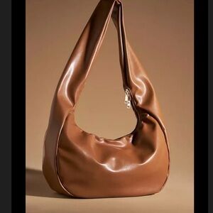 Slouchy Leather 
Shoulder Tote
NWOT
COLOR-    Butterscotch /Light Brown